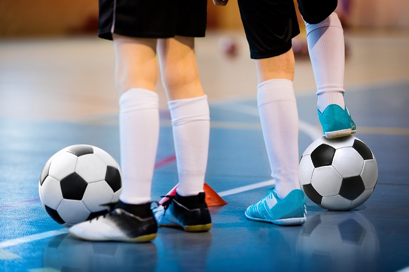 Futsal soccer training for two young players